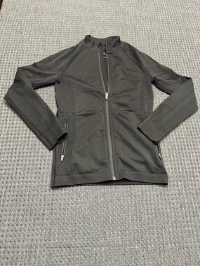 Figs black seamless scrub jacket.